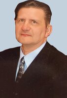 Carl J Guida